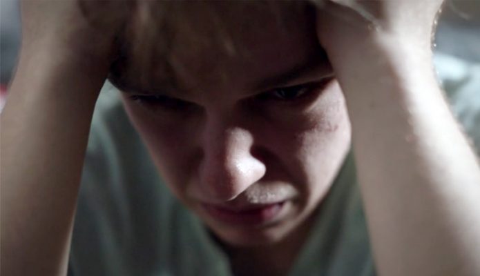 boy with hands on head, i've been dumped